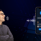 Man speaking towards a smartphone screen displaying a voice chat application interface, with sound waves visualizing voice input against a dark tech-themed background.