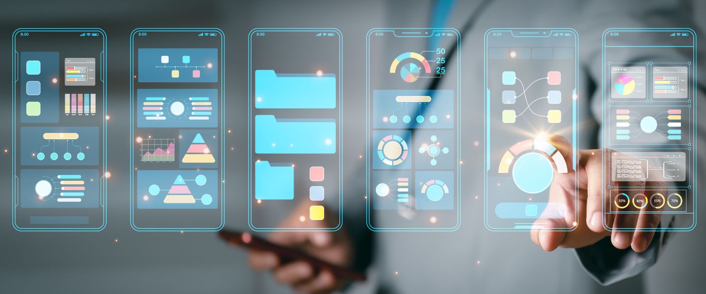 Person interacting with virtual mobile app interface prototypes displaying charts, graphs, and UI elements for app development.
